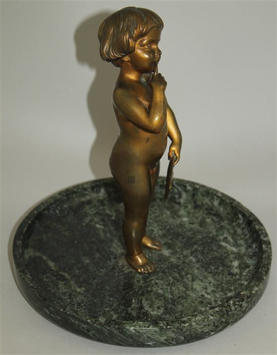 An early 20th century patinated bronze of a small child standing holding a letter, 9ins wide